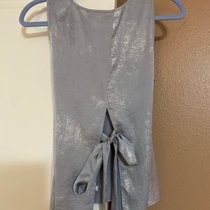 Silver hi-lo tank top with an open back